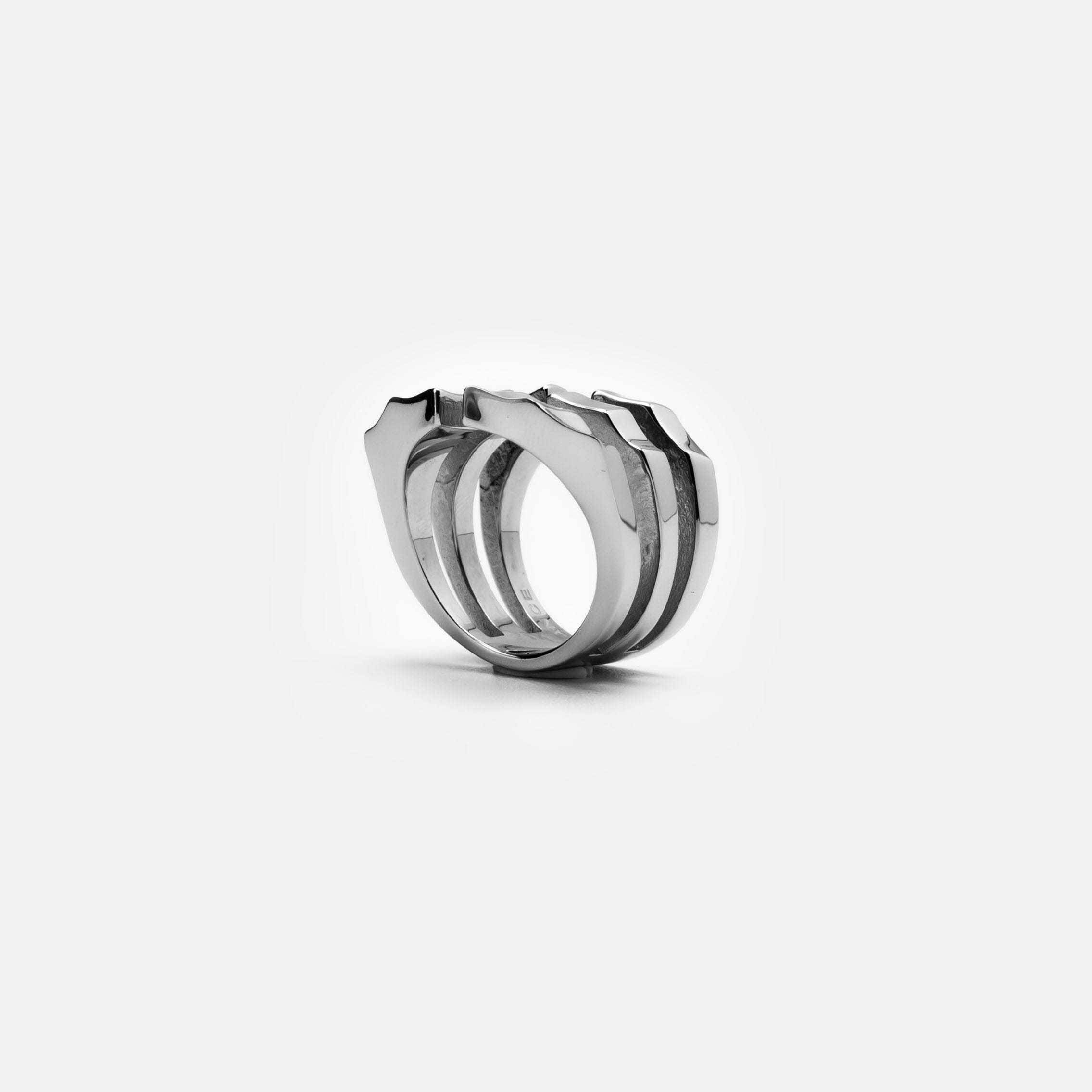 CAGED EXO-ARMOUR RING