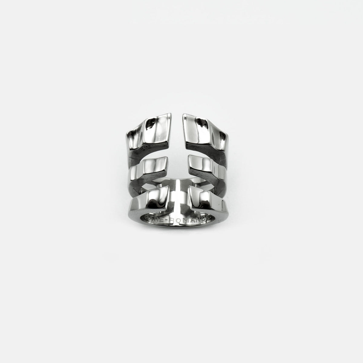 CAGED EXO-ARMOUR RING