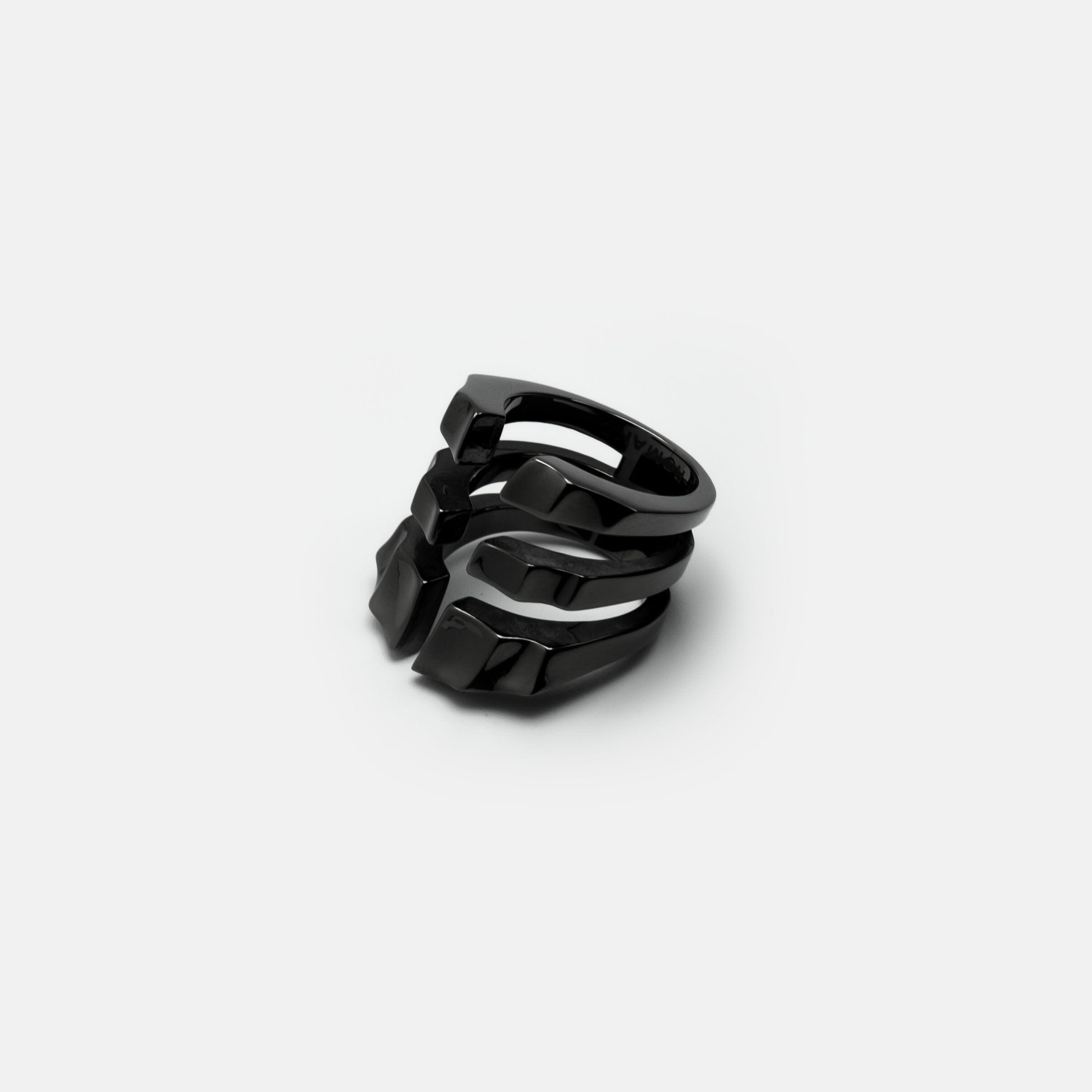 CAGED EXO-ARMOUR RING
